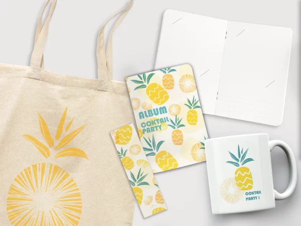Kit cadeau au couleur de l'été avec un visuel ananas vert et jaune. Imprimé sur différents supports, tel que des carnets, mugs...
